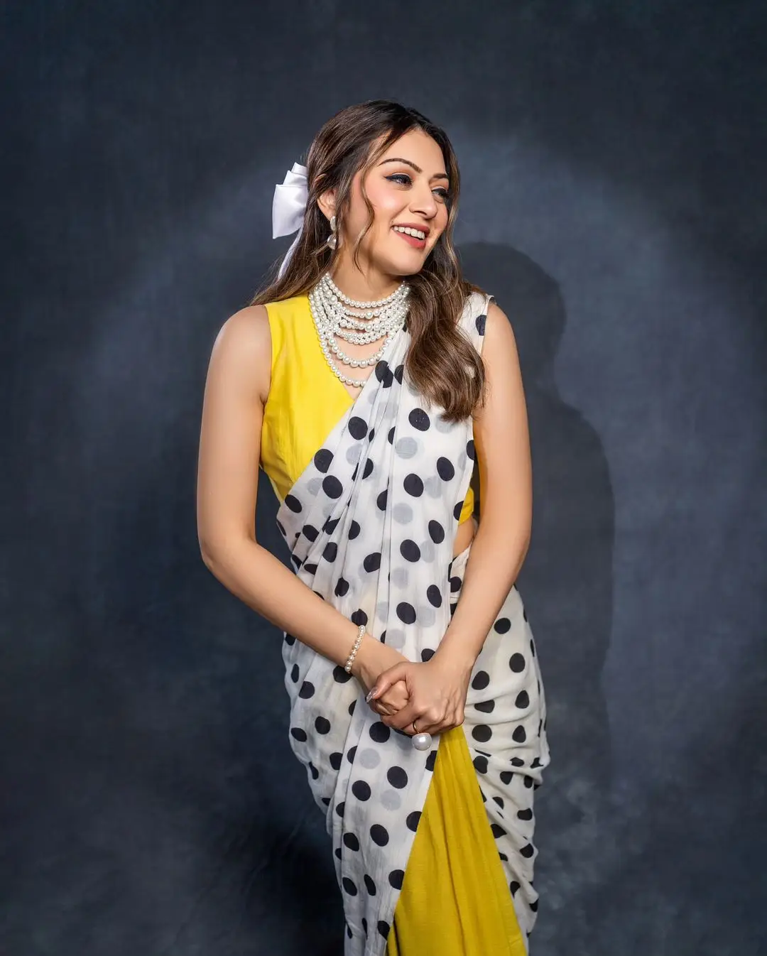 Hansika Motwani Wearing Beautiful Earrings Jewellery Yellow Saree